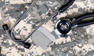 Medic Stethoscope and Dog Tags with Digi Camo background