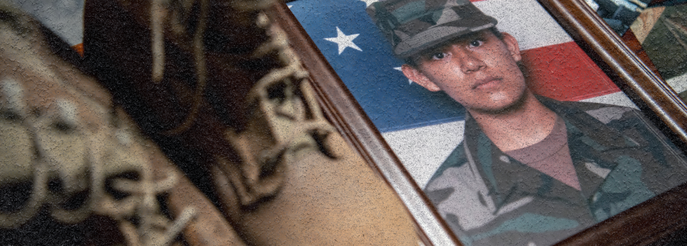 Boots and photo of a veteran